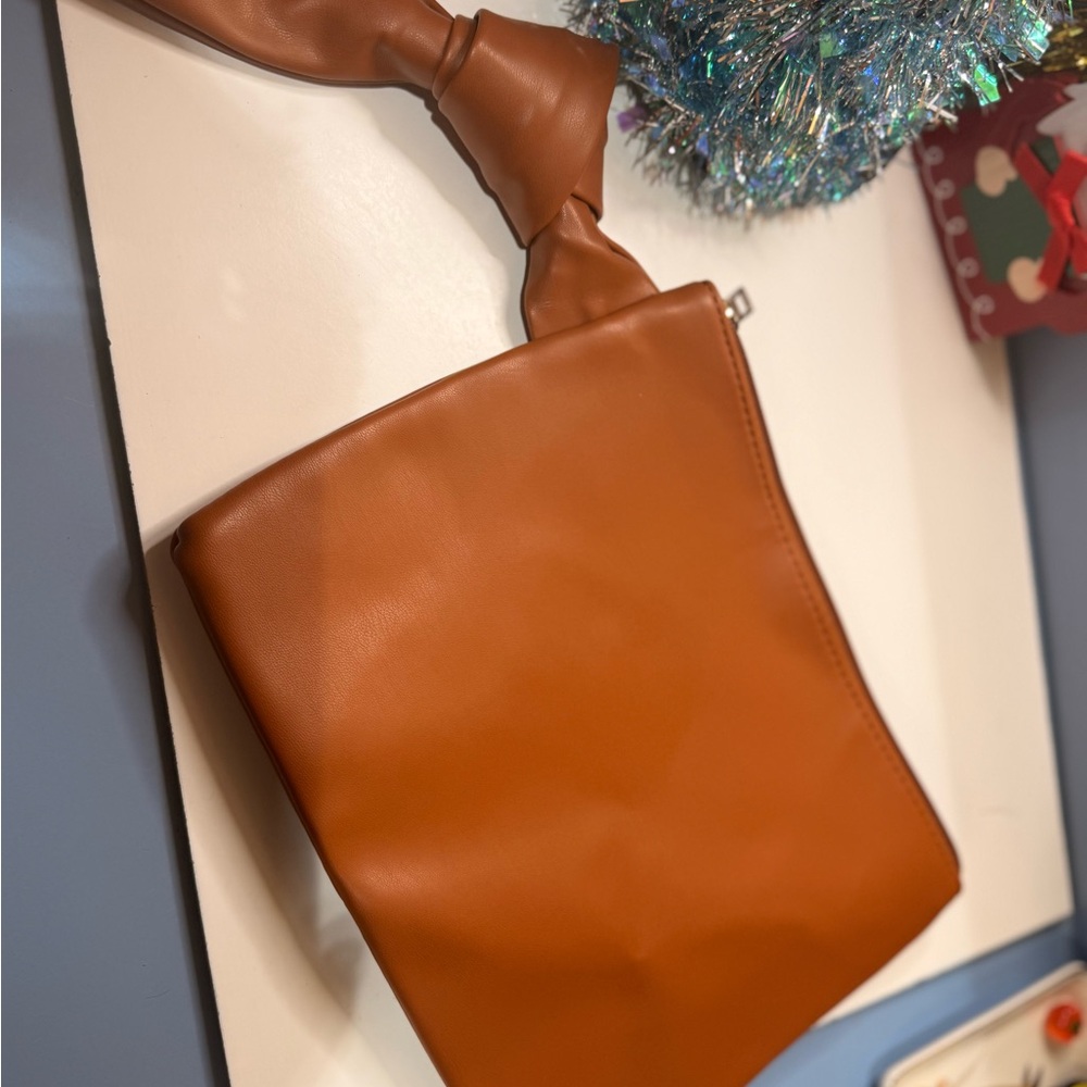 Wristlet/ purse:  Tan Leather wristlet Bag